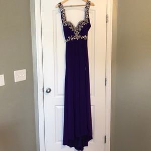 Full length purple prom dress.
